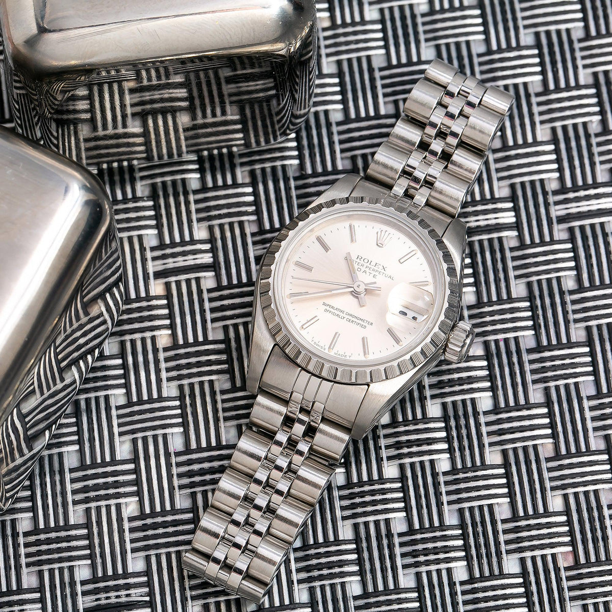 Pre-Owned Rolex Date 26MM 6924 Silver Dial Engine Turned Bezel Stainless Steel Jubilee Bracelet