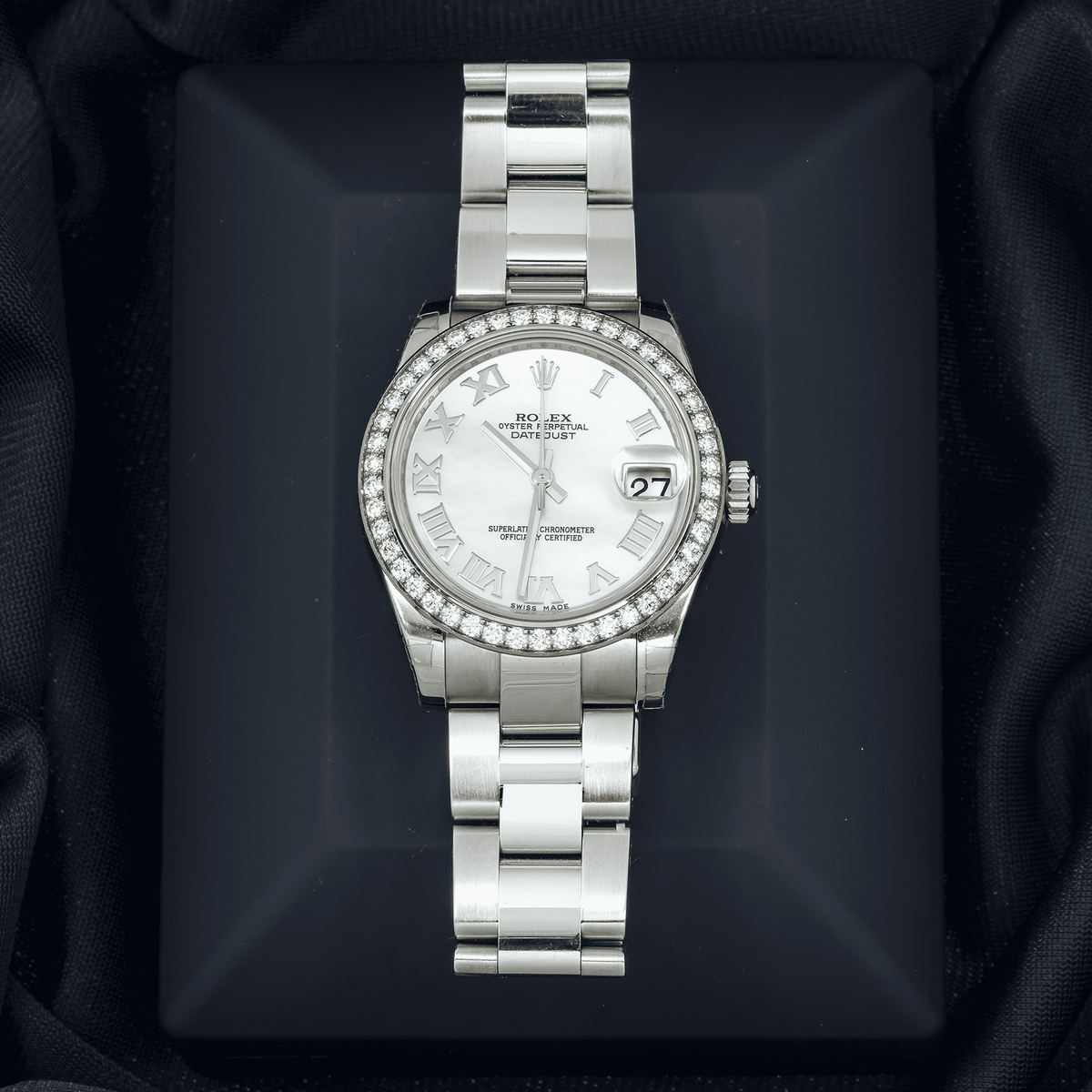 Pre-Owned Rolex Datejust 31MM 178240 White Mother of Pearl Roman Dial Diamond Bezel Stainless Steel Oyster Bracelet