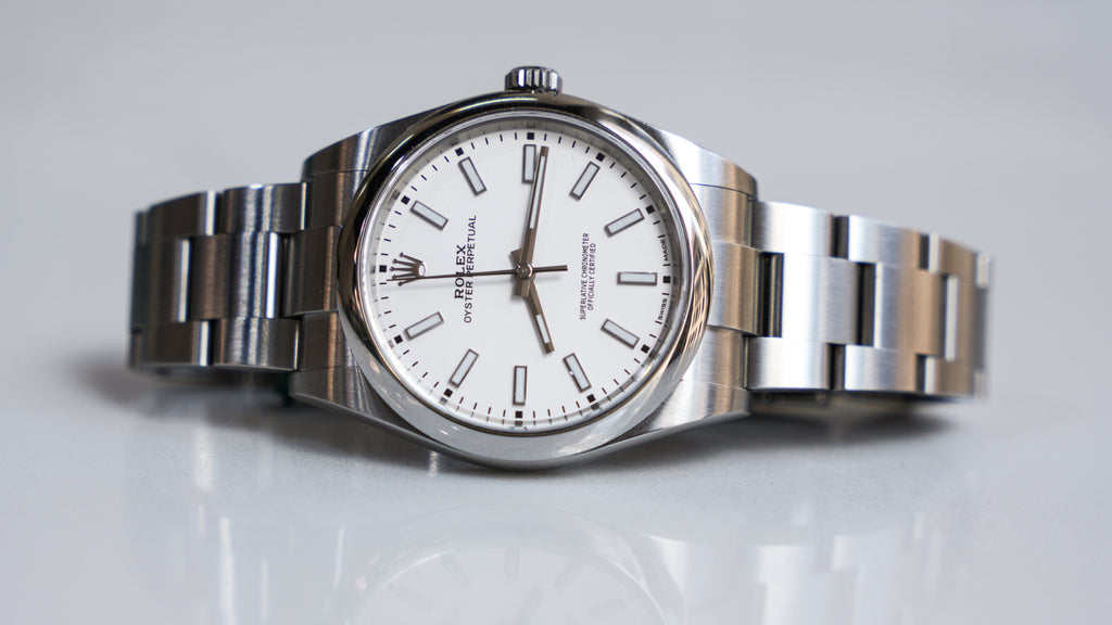 Pre-Owned Rolex 39mm Oyster Perpetual White Rhodium Dial with Stainless Steel Oyster Bracelet 114300