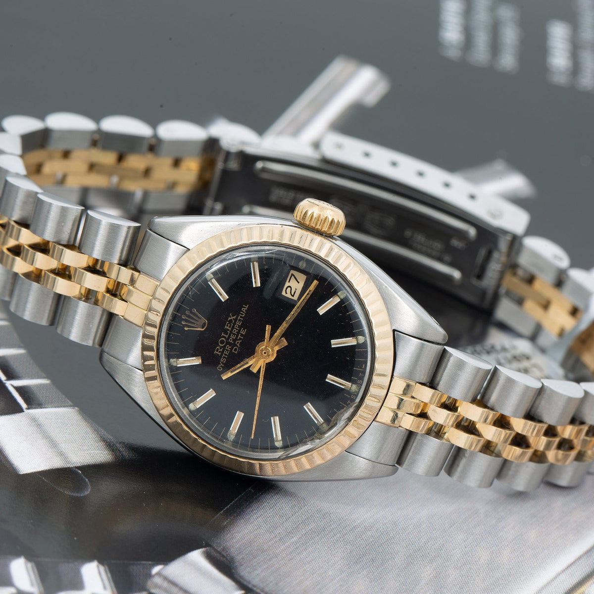 Pre-Owned Rolex Datejust 26MM 6917 Black Dial Fluted Bezel Two Tone Yellow Gold Jubilee Bracelet