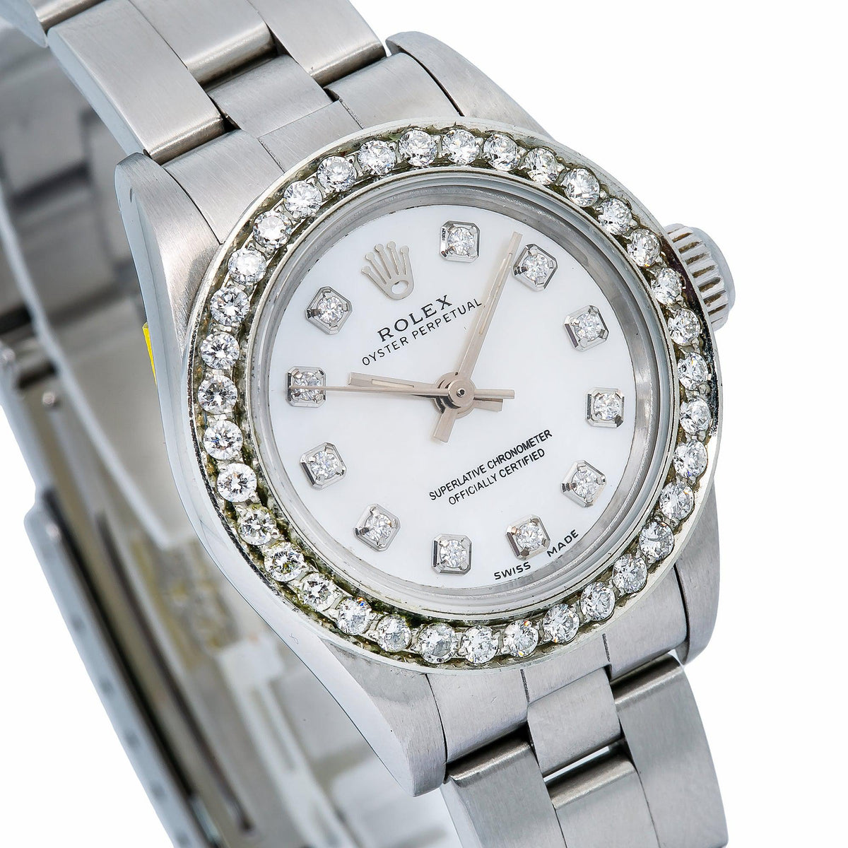 Pre-Owned Rolex Oyster Perpetual 26MM 76094 White Mother of Pearl Diamond Dial Diamond Bezel Stainless Steel Oyster Bracelet