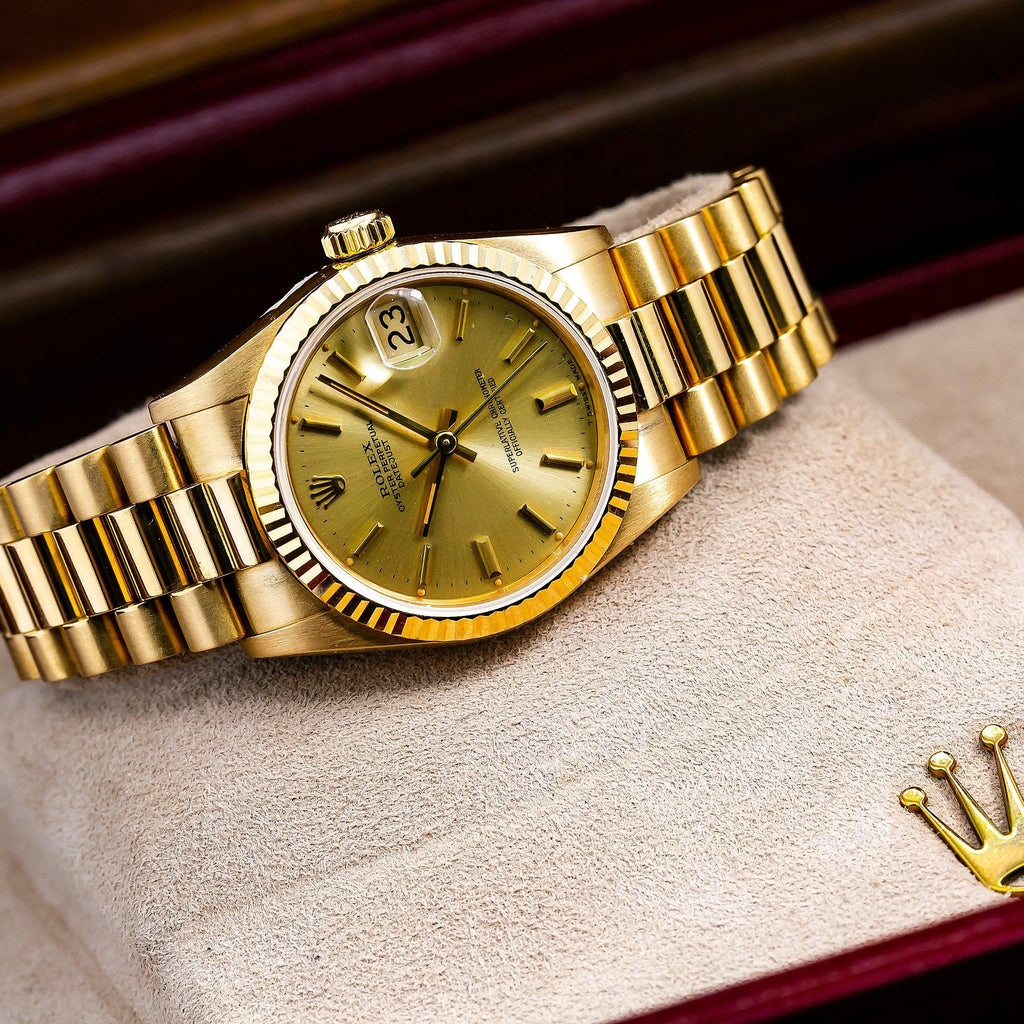 Pre-Owned Rolex Datejust 31MM 68278 Champagne Dial Fluted Bezel 18K Yellow Gold President Bracelet