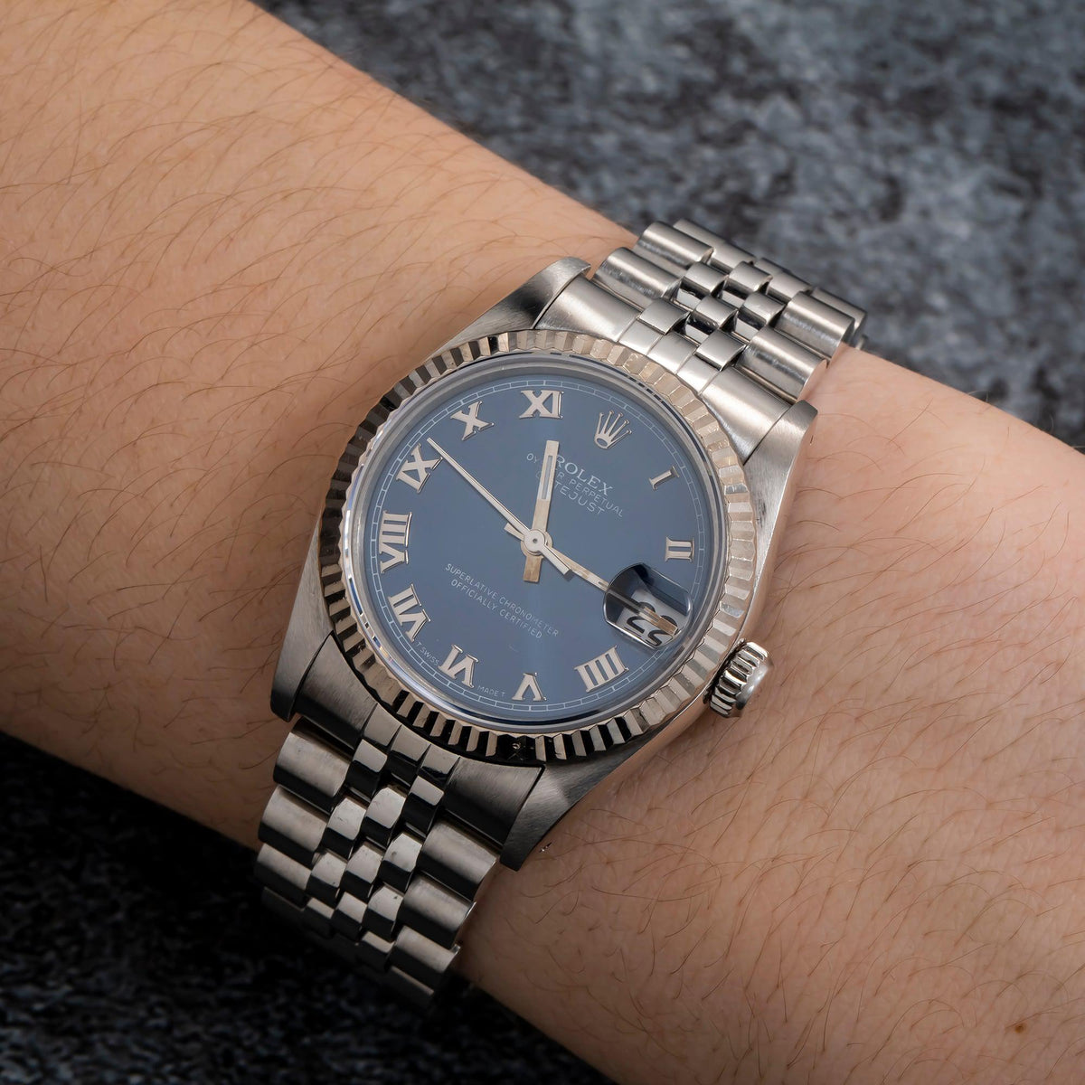 Pre-Owned Rolex Datejust 31MM 68274 Blue Roman Dial Fluted Bezel Stainless Steel Jubilee Bracelet