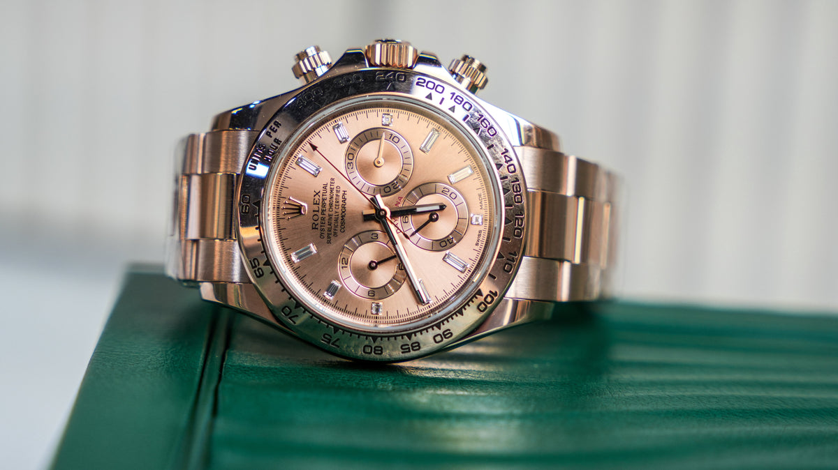 Pre-Owned Rolex Daytona Rose Gold with Pink Champagne Dial with Diamond Baguette Hour Markers 116505