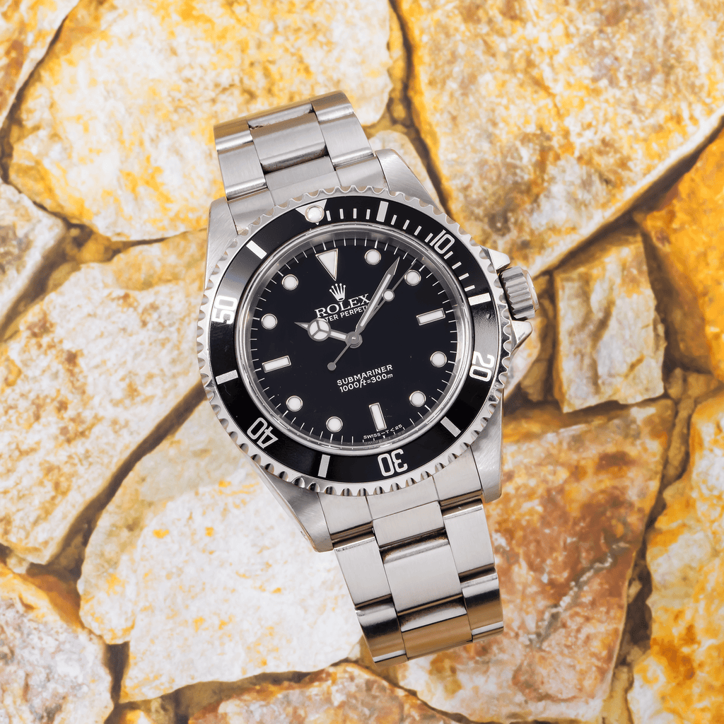 Pre-Owned Rolex Submariner No Date Stainless Steel Black Dial & Aluminum Bezel Oyster Bracelet 14060