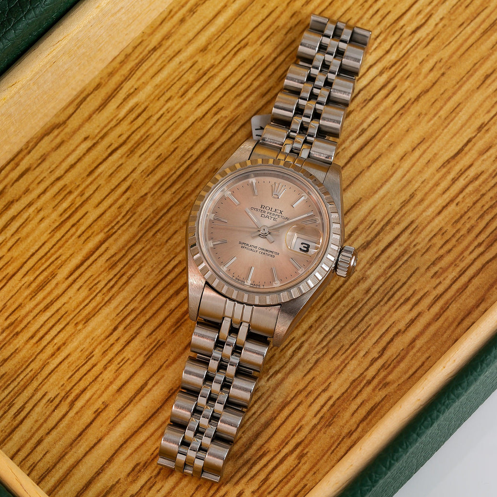Pre-Owned Rolex Date 26MM 6924 Brown Dial Engine Turned Bezel Stainless Steel Jubilee Bracelet