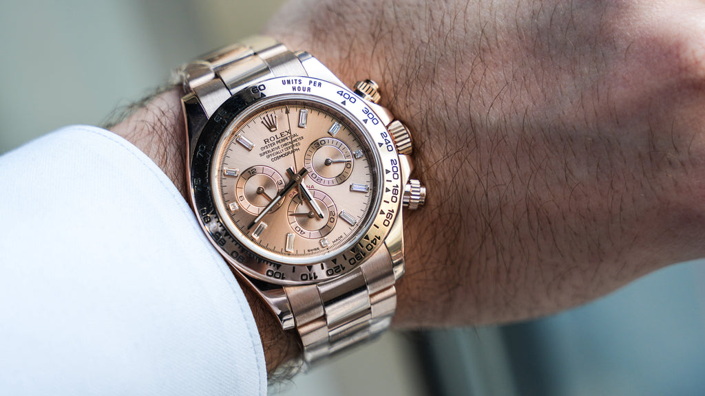 Pre-Owned Rolex Daytona Rose Gold with Pink Champagne Dial with Diamond Baguette Hour Markers 116505
