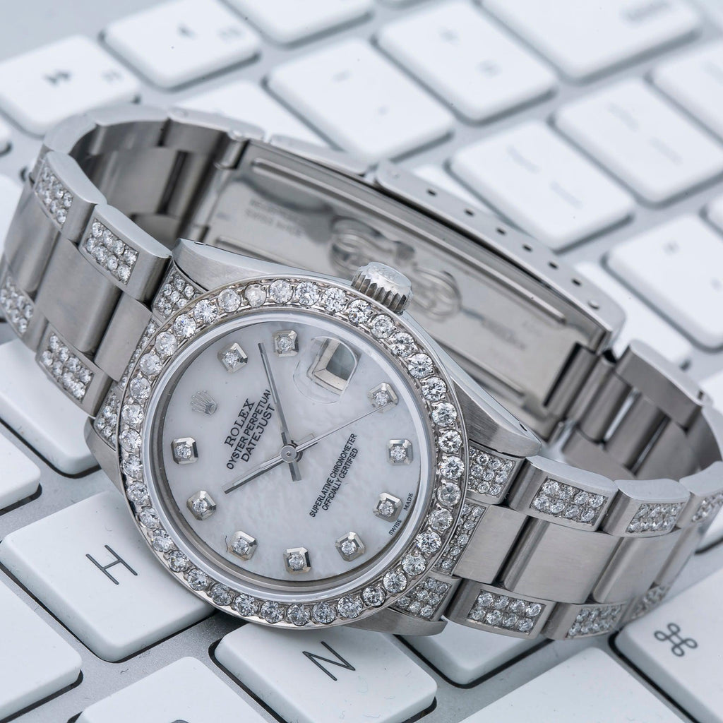 Pre-Owned Rolex Datejust 31MM 78240 White Mother of Pearl Diamond Dial Diamond Bezel Stainless Steel Semi Diamond Oyster Bracelet 4.75ct