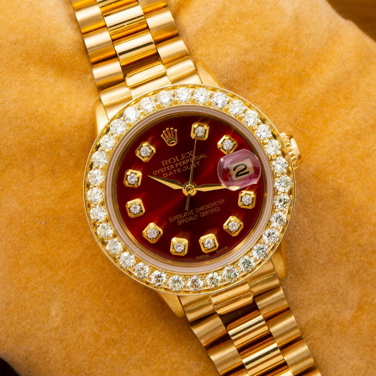 Pre-Owned Rolex Datejust 26MM 69178 Red Diamond Dial Diamond Bezel 18K Yellow Gold President Bracelet 0.95ct