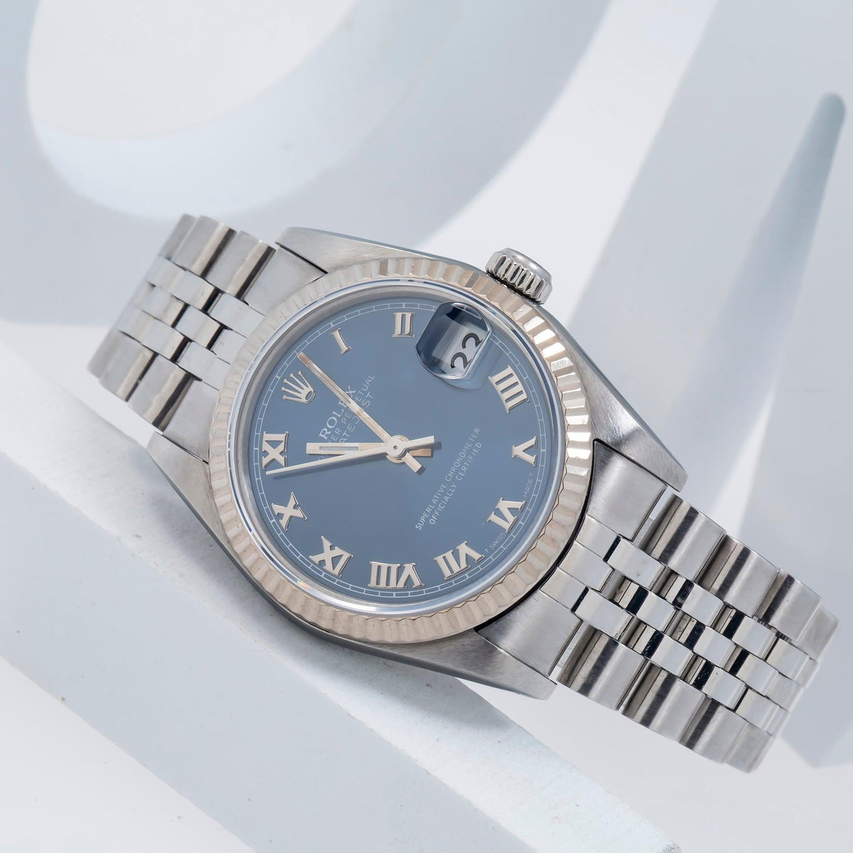 Pre-Owned Rolex Datejust 31MM 68274 Blue Roman Dial Fluted Bezel Stainless Steel Jubilee Bracelet