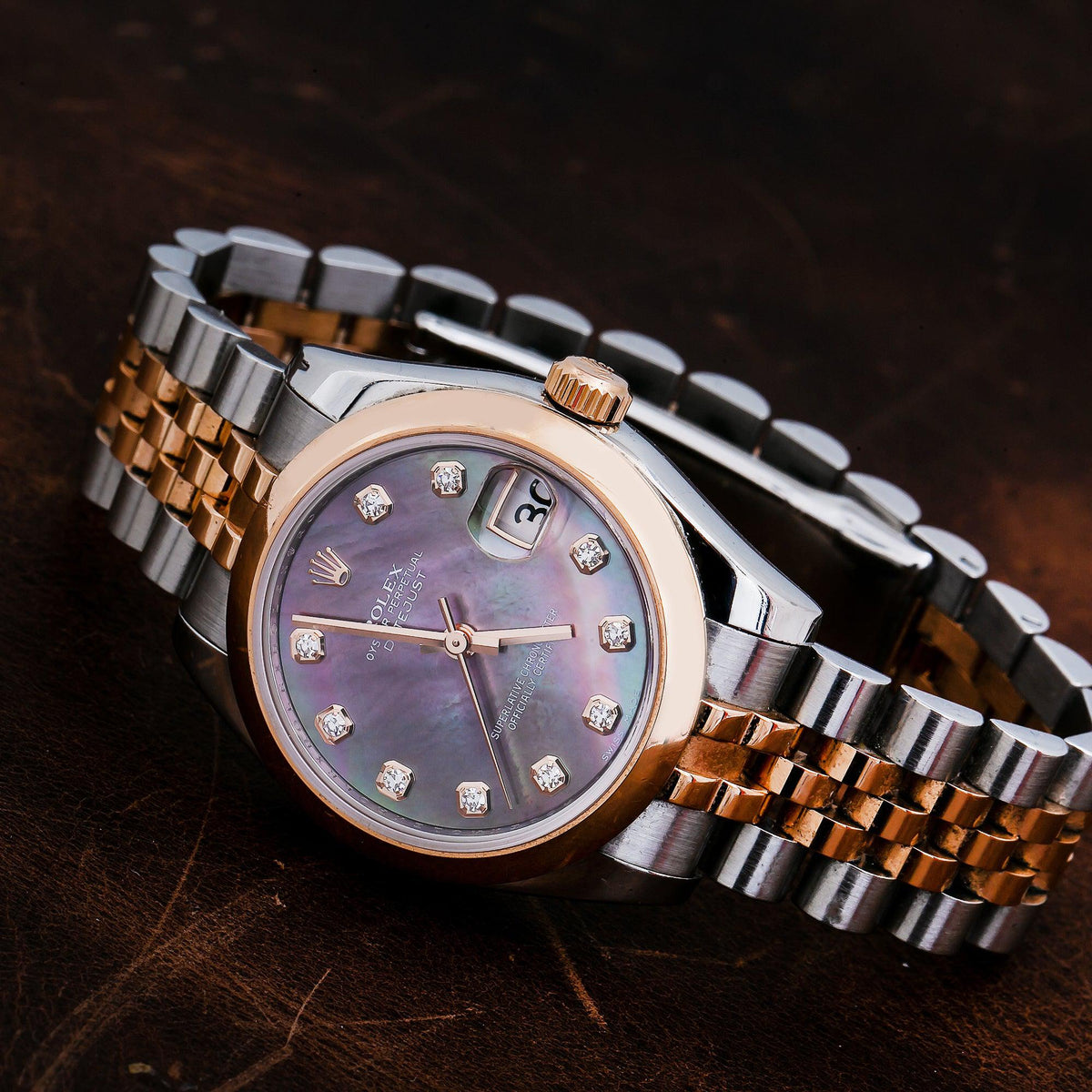 Pre-Owned Rolex Datejust 31MM 178241 Black Mother of Pearl Diamond Dial Smooth Bezel Two Tone Rose Gold Jubilee Bracelet