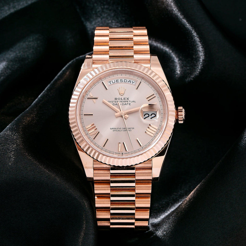 Pre-Owned Rolex Day-Date 40MM 228235 Sundust Roman Dial Fluted Bezel 18K Rose Gold President Bracelet