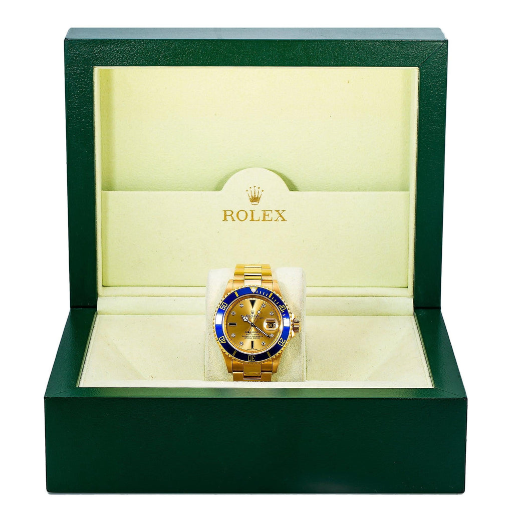Pre-Owned Rolex Submariner Date 40MM 16618 Champagne Diamond Dial Blue Ceramic Bezel 18K Yellow Gold Oyster Bracelet