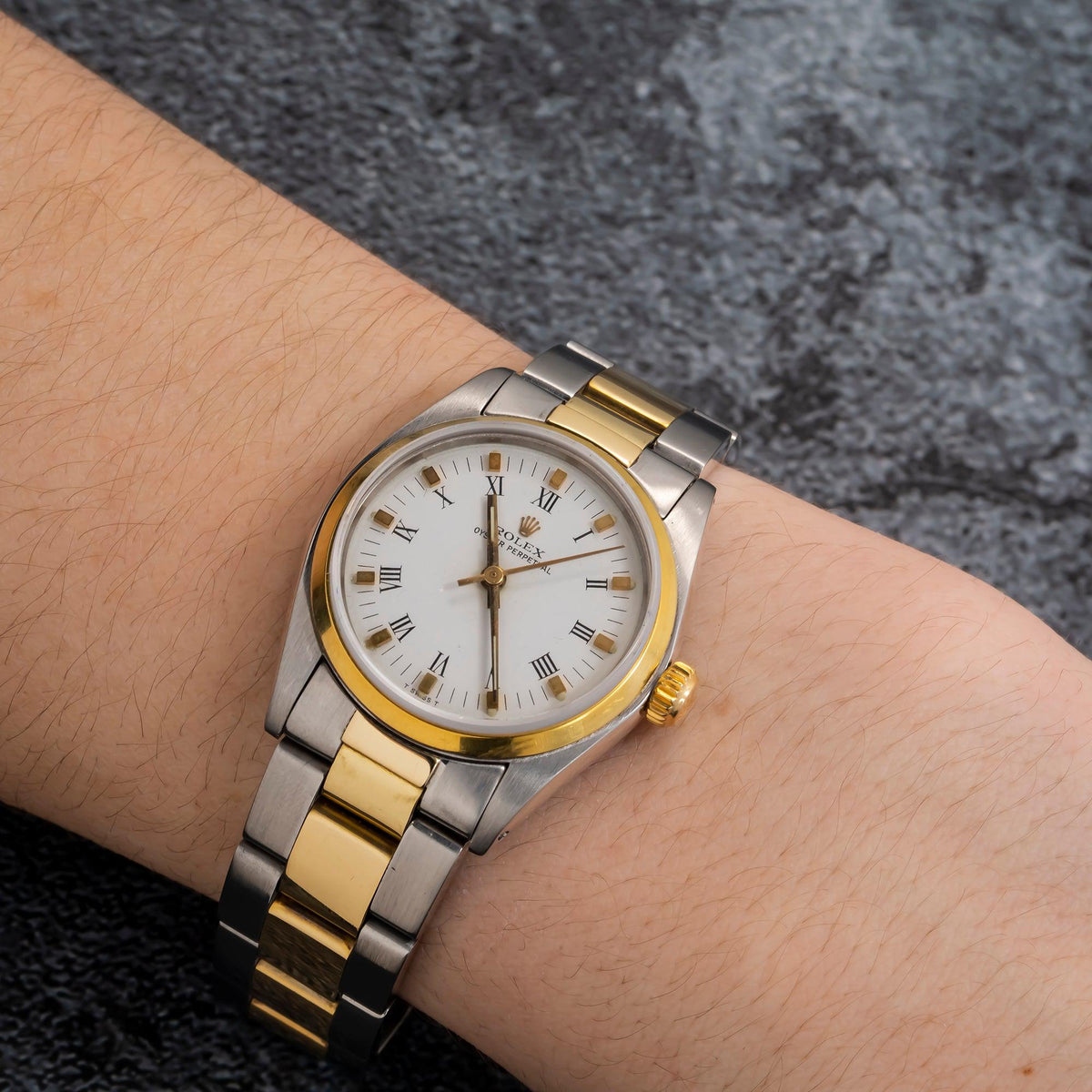 Pre-Owned Rolex Oyster Perpetual 31MM 6748 White Roman Dial Smooth Bezel Two Tone Yellow Gold Oyster Bracelet