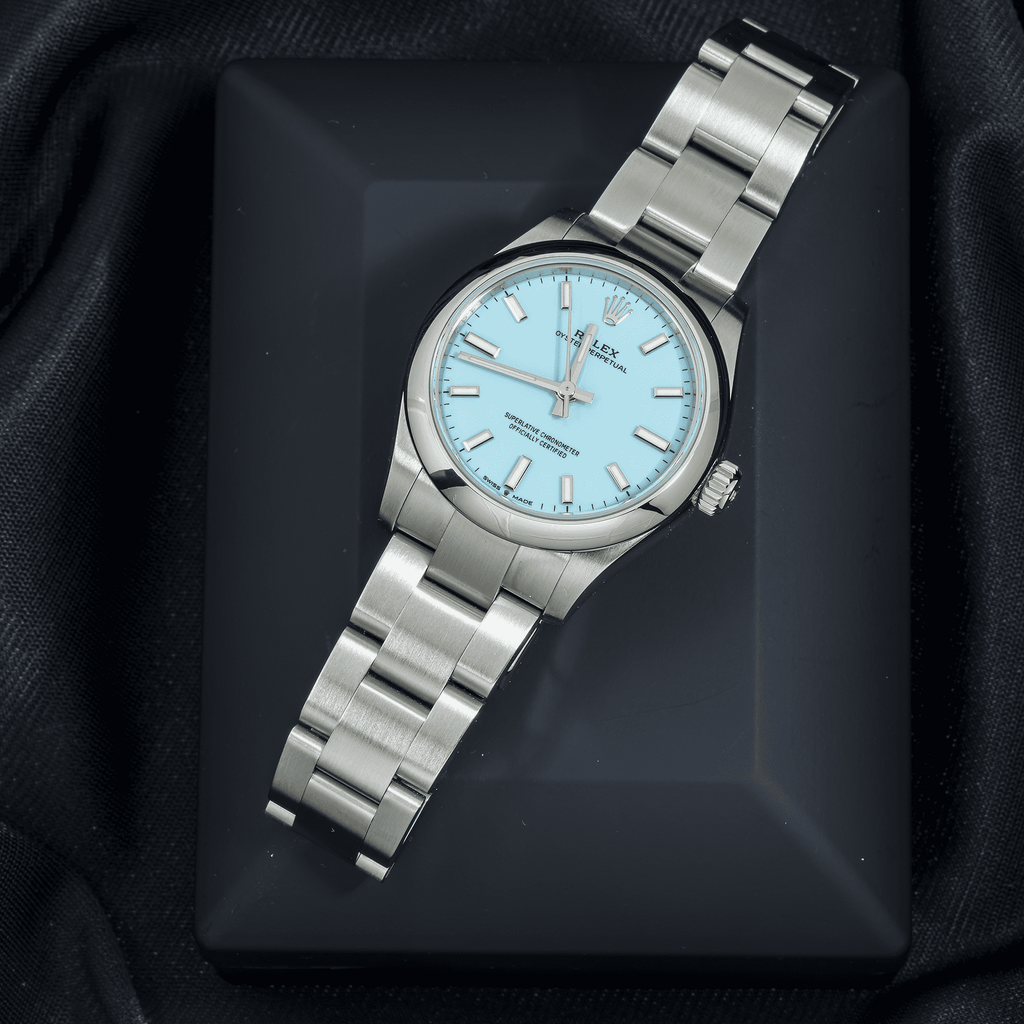 Pre-Owned Rolex Oyster Perpetual 31MM 277200 Ice Blue Dial Smooth Bezel Stainless Steel Oyster Bracelet