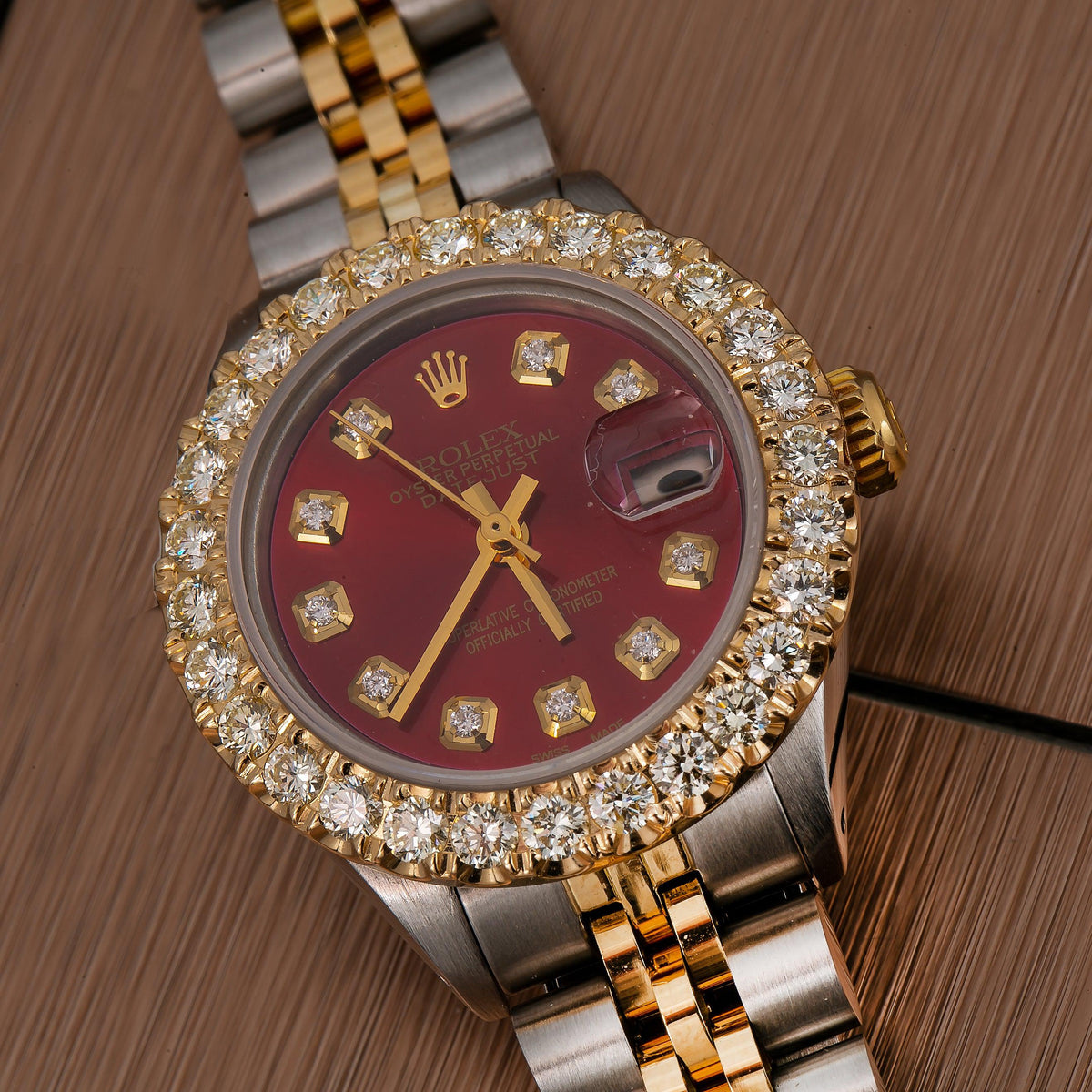 Pre-Owned Rolex Datejust 26MM 69173 Red Diamond Dial Diamond Bezel Two Tone Yellow Gold Jubilee Bracelet
