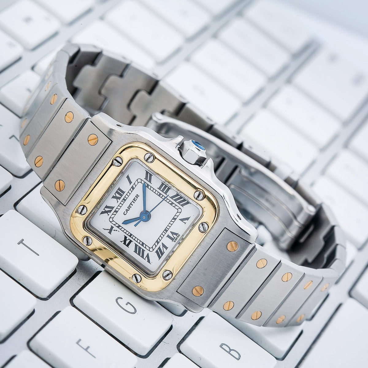 Pre-Owned Cartier Santos Galbée 24MM W20012C4 Silver Roman Dial Yellow Gold Bezel Two Tone Yellow Gold Bracelet