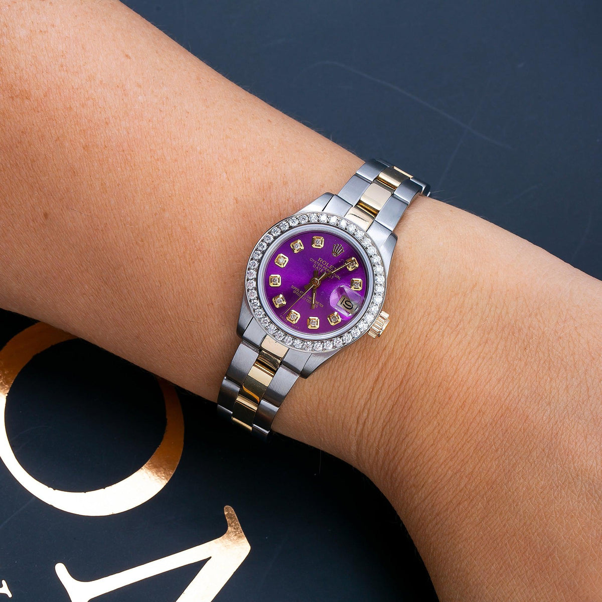 Pre-Owned Rolex Datejust 26MM 69173 Purple Diamond Dial Diamond Bezel Two Tone Yellow Gold Oyster Bracelet 0.9ct