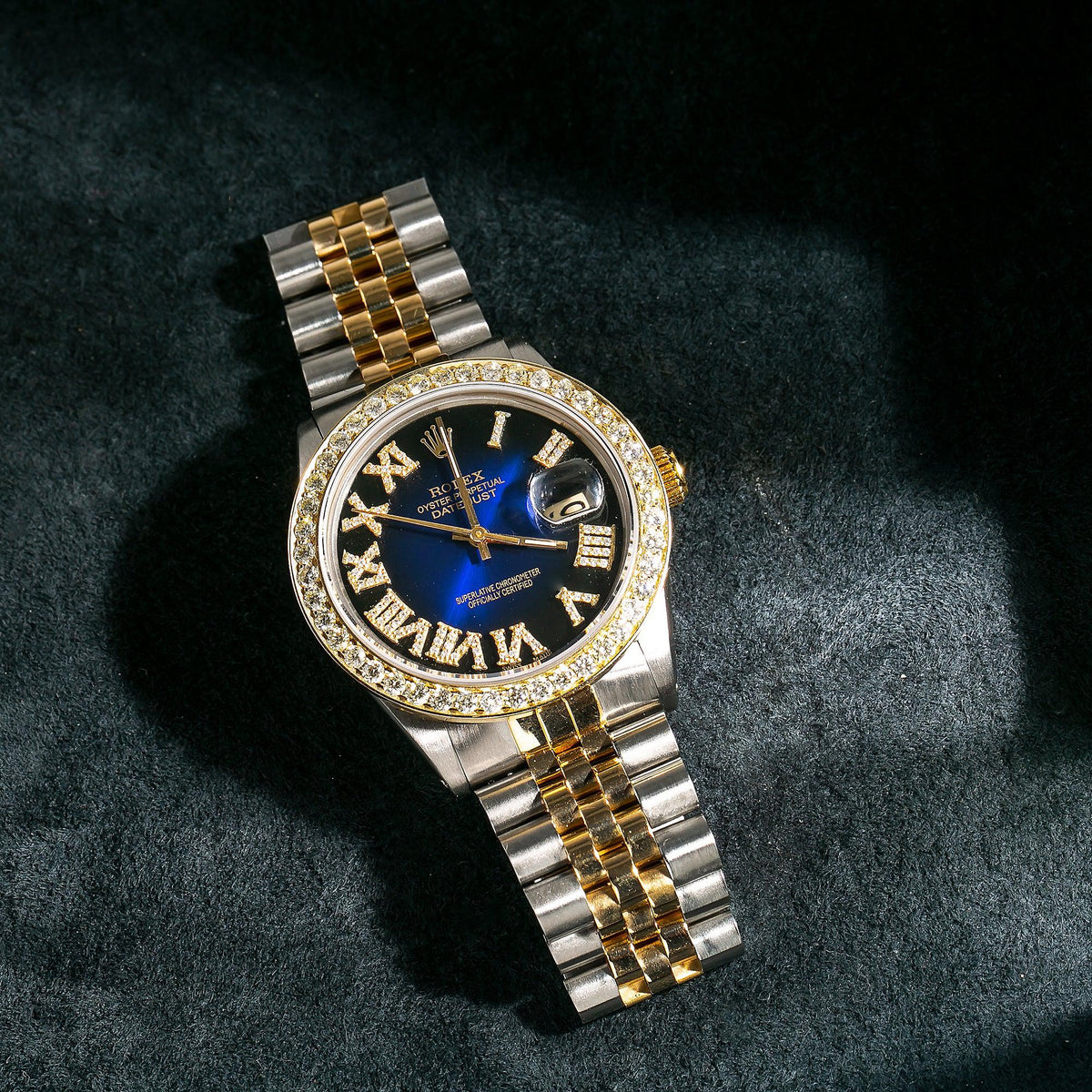 Pre-Owned Rolex Datejust 36MM 16233 Blue Roman Diamond Dial Diamond Bezel Two Tone Yellow Gold Jubilee Bracelet 1.35ct