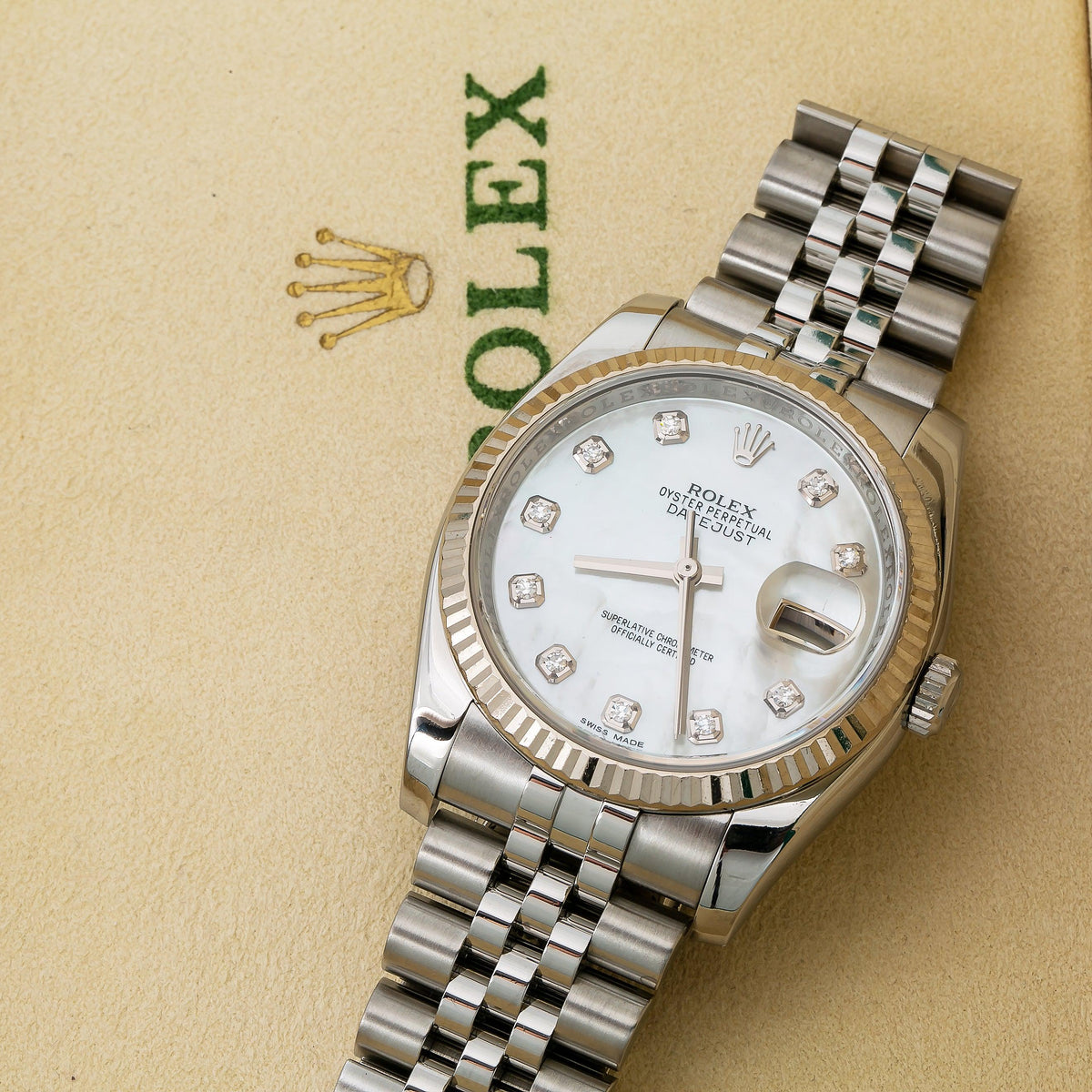 Pre-Owned Rolex Datejust 36MM 116234 White Mother of Pearl Diamond Dial Fluted Bezel Stainless Steel Jubilee Bracelet
