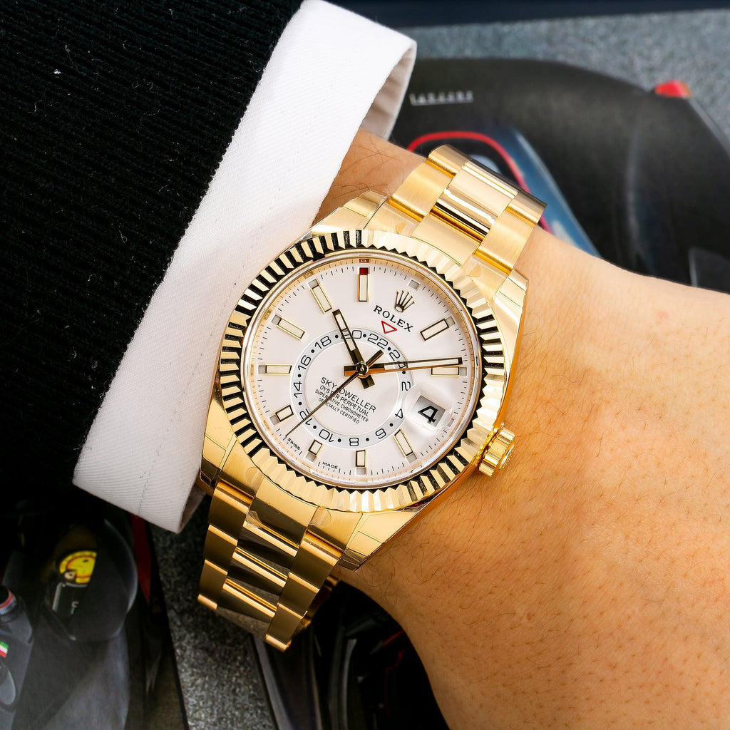 Pre-Owned Rolex Sky-Dweller 42MM 326938 White Dial Fluted Bezel 18K Yellow Gold Oyster Bracelet
