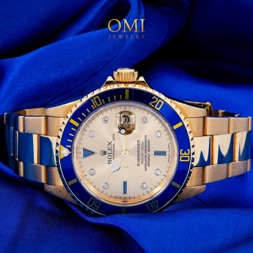 Pre-Owned Rolex Submariner Date 40MM 16618 Champagne Diamond Dial Blue Ceramic Bezel 18K Yellow Gold Oyster Bracelet