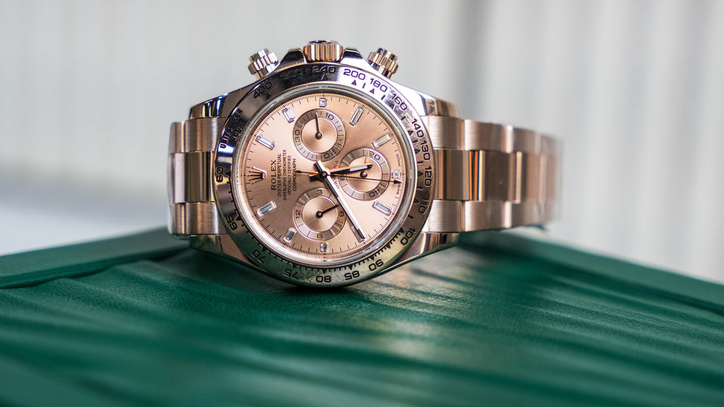 Pre-Owned Rolex Daytona Rose Gold with Pink Champagne Dial with Diamond Baguette Hour Markers 116505