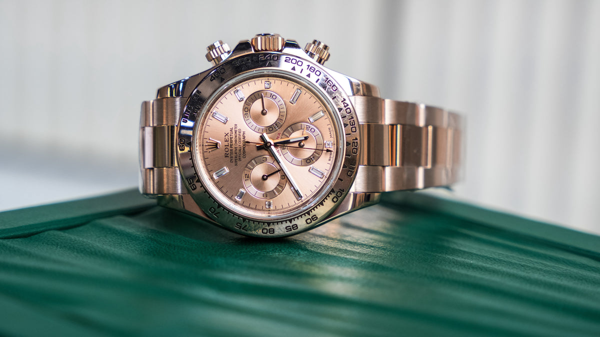 Pre-Owned Rolex Daytona Rose Gold with Pink Champagne Dial with Diamond Baguette Hour Markers 116505
