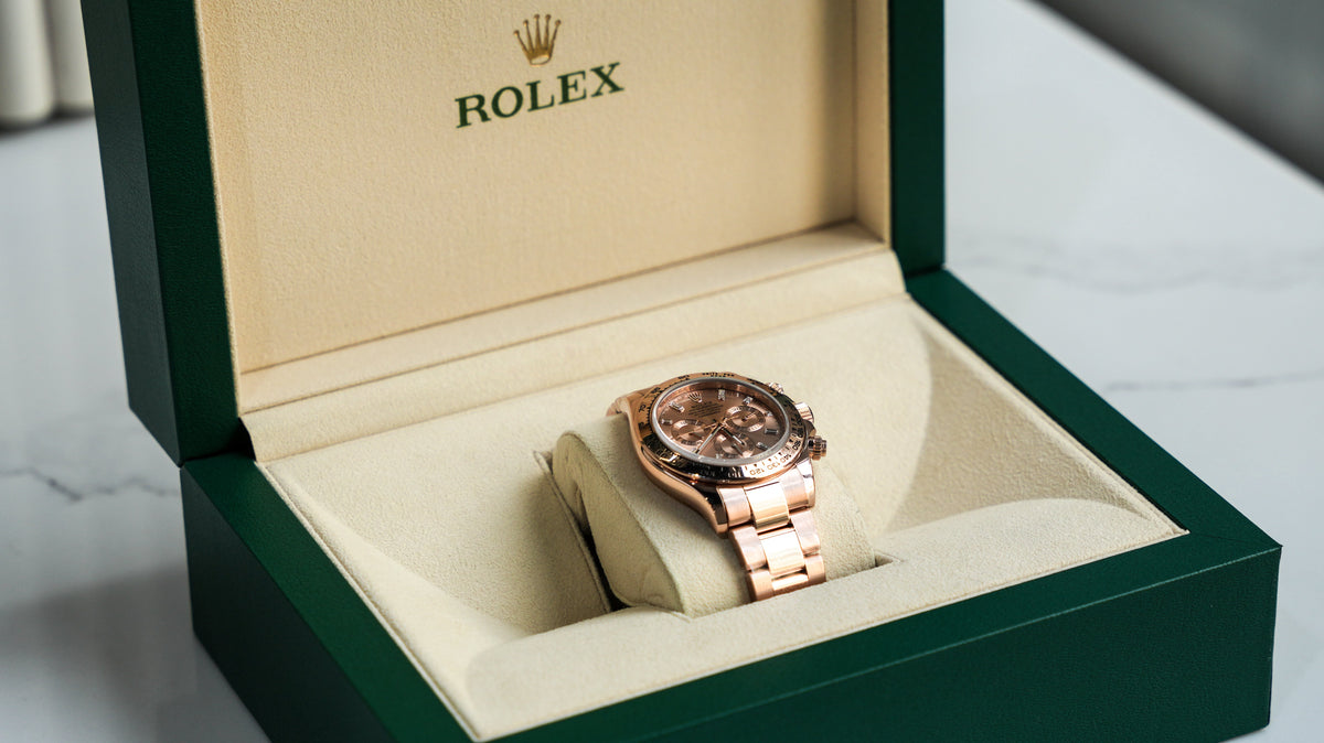 Pre-Owned Rolex Daytona Rose Gold with Pink Champagne Dial with Diamond Baguette Hour Markers 116505