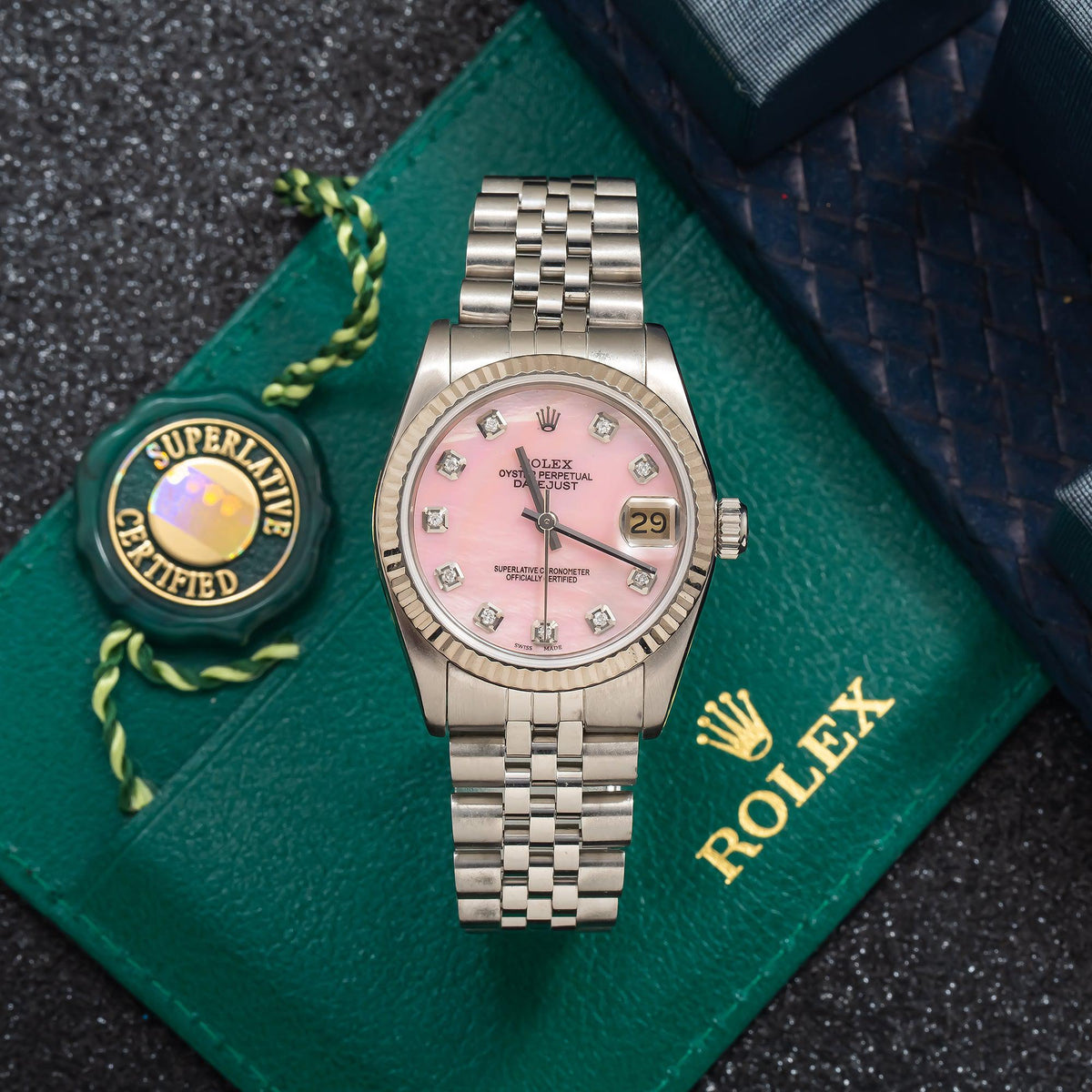 Pre-Owned Rolex Datejust 31MM 68274 Pink Mother of Pearl Diamond Dial Fluted Bezel Stainless Steel Jubilee Bracelet