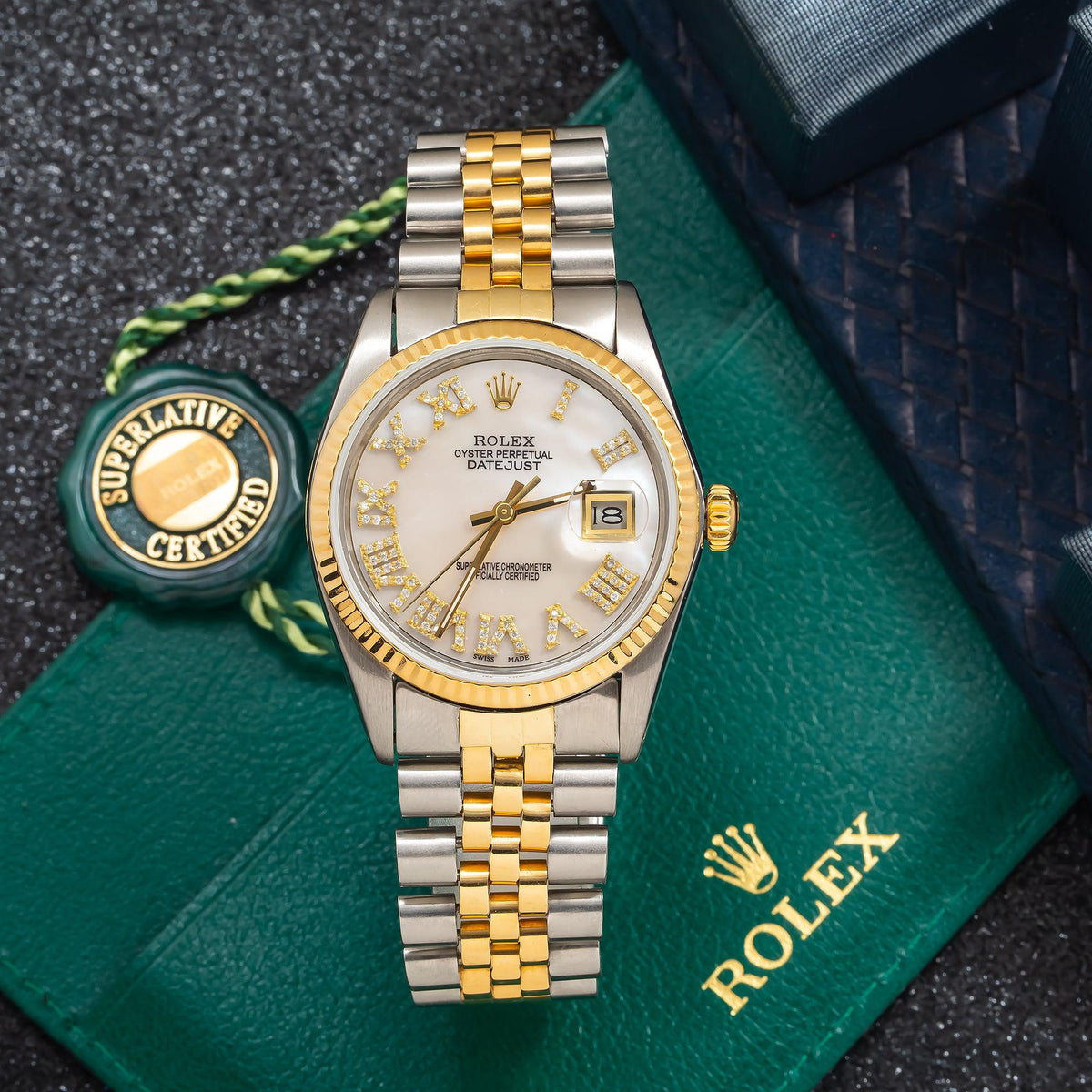 Pre-Owned Rolex Datejust 31MM 6824 Mother of Pearl Roman Diamond Dial Fluted Bezel Two Tone Yellow Gold Jubilee Bracelet