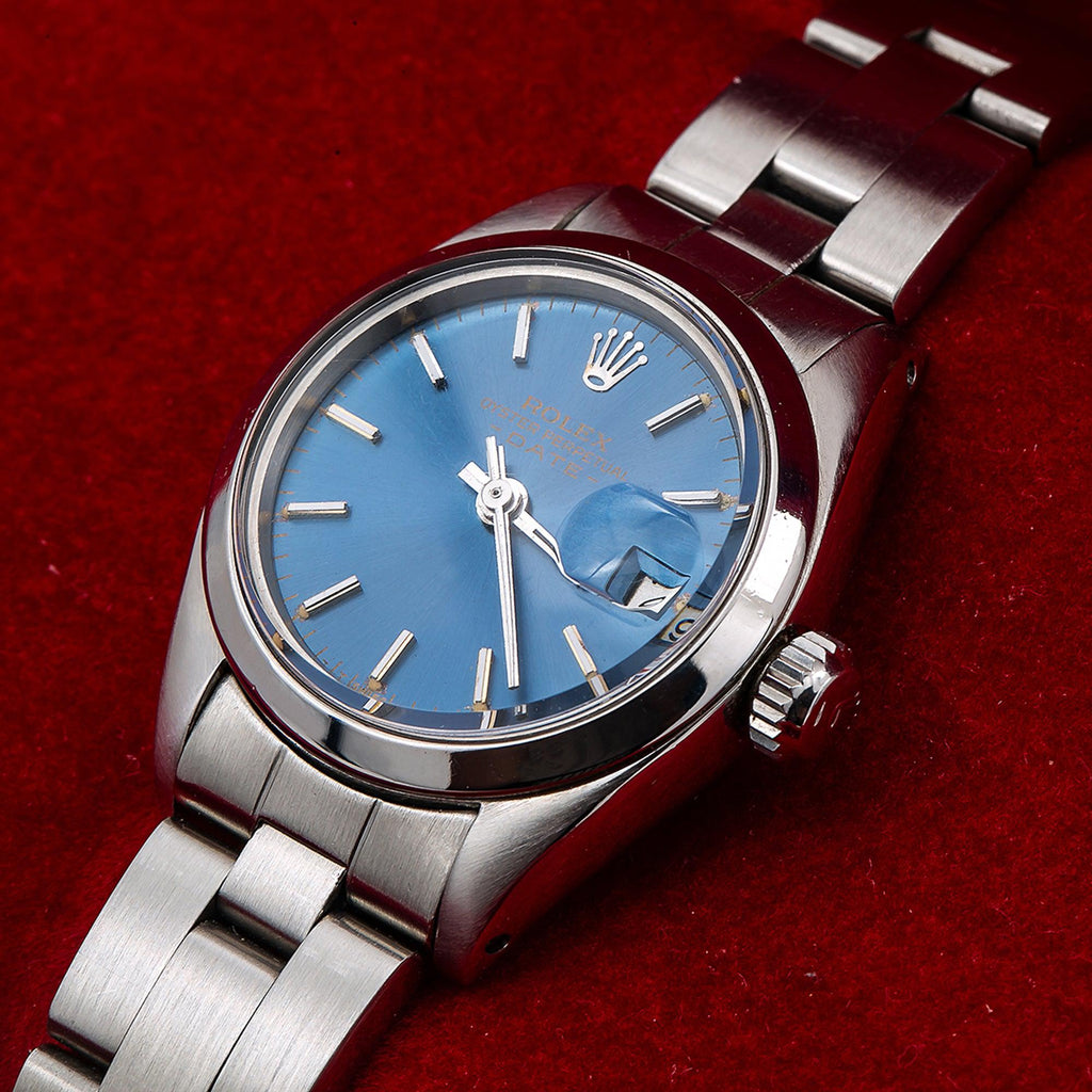 Pre-Owned Rolex Date 26MM 69160 Blue Dial Smooth Bezel Stainless Steel Oyster Bracelet