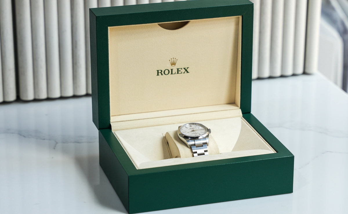 Pre-Owned Rolex 39mm Oyster Perpetual White Rhodium Dial with Stainless Steel Oyster Bracelet 114300