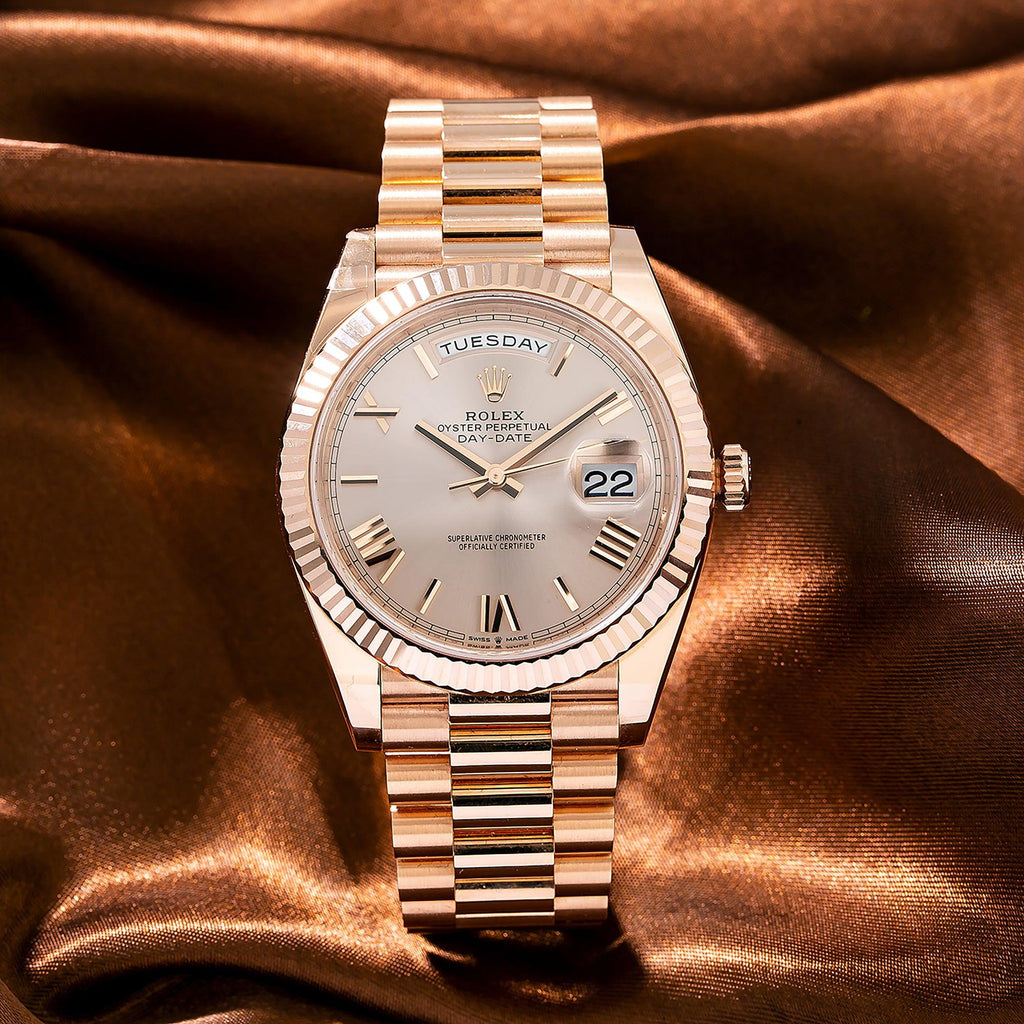 Pre-Owned Rolex Day-Date 40MM 228235 Sundust Roman Dial Fluted Bezel 18K Rose Gold President Bracelet