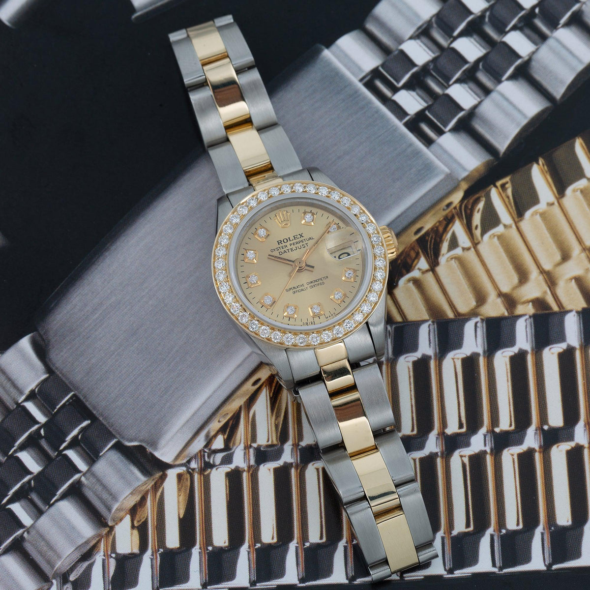 Pre-Owned Rolex Datejust 26MM 6917 Champagne Diamond Dial Diamond Bezel Two Tone Yellow Gold Oyster Bracelet 0.9ct
