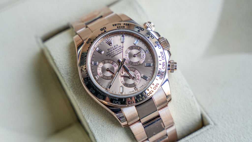 Pre-Owned Rolex Daytona Rose Gold with Pink Champagne Dial with Diamond Baguette Hour Markers 116505